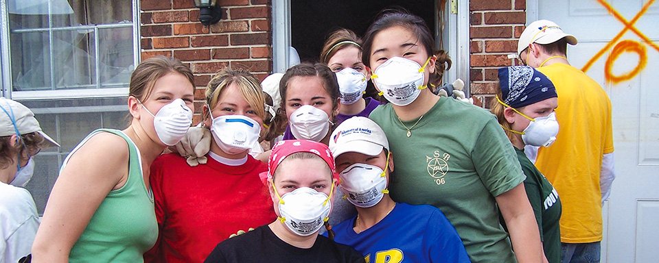 students helping clear homes after hurricane Katrina
