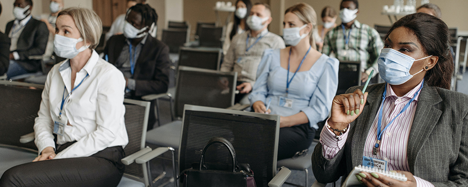 individuals seated in a workshop session