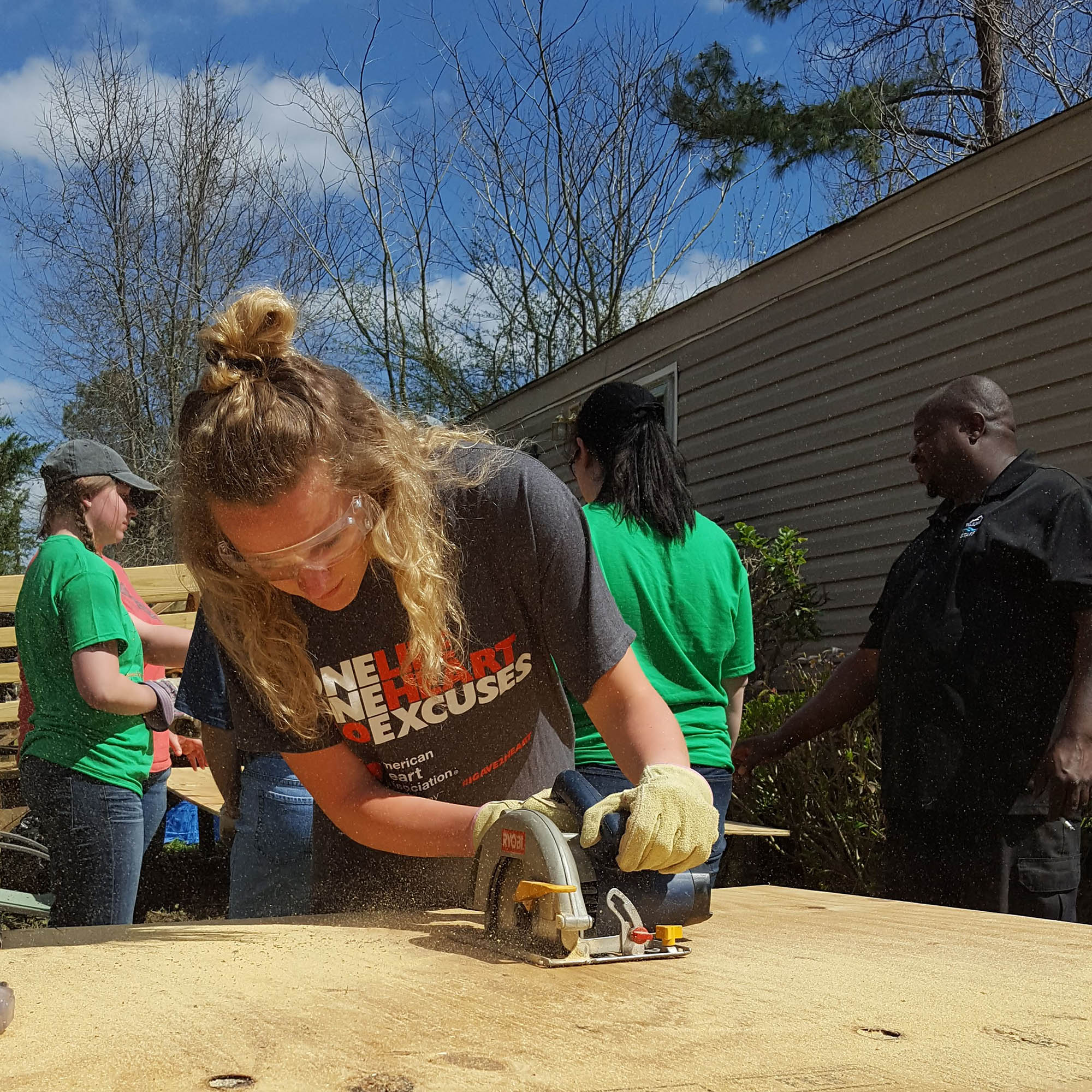 Students using power tools during ASB